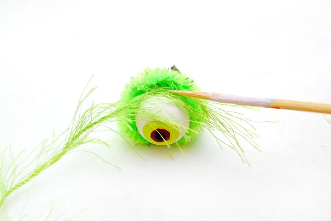 Adding hairy yarn to eyeball