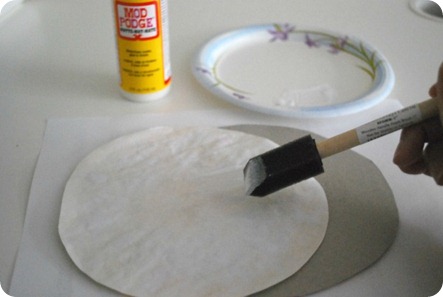 Adhering sheet music to cardboard backing