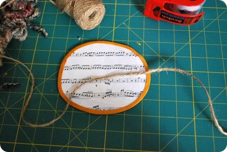 Attaching medallion to wreath with jute