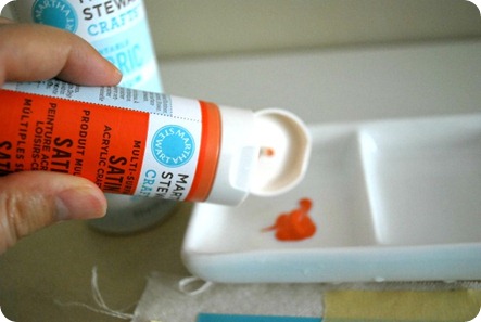 Applying paint with stencil brush