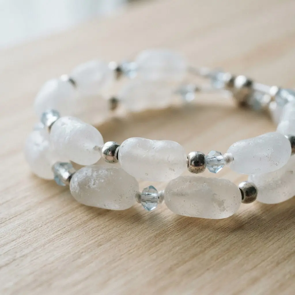 A bracelet combining white jelly beans with shiny silver spacer beads.