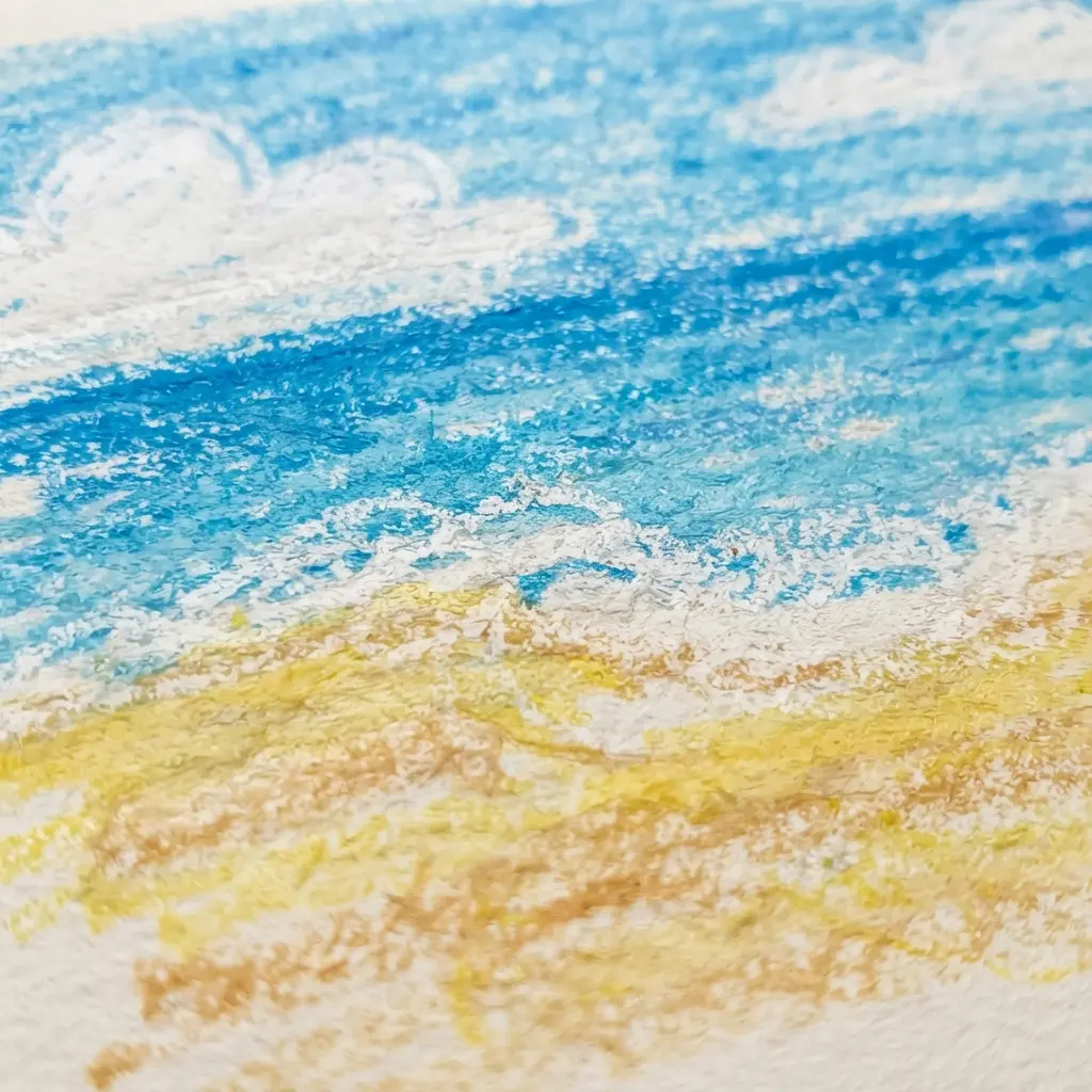 A beginner's coastal scene with a wavy blue ocean line and a flat yellow sand area.