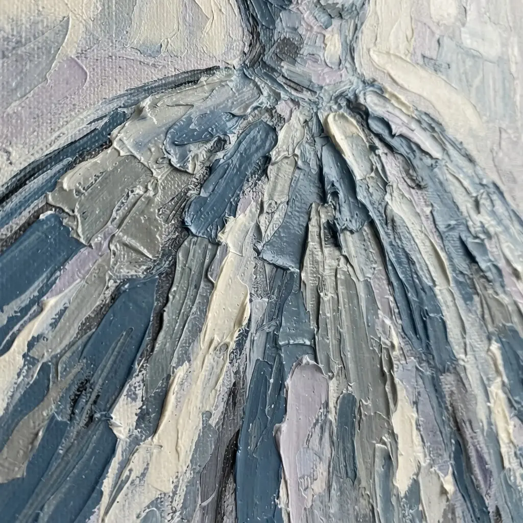The back view of a tulle ball gown with fabric gathered into a soft, puffed bustle effect.