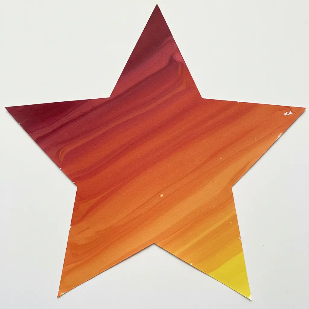 A star-shaped paper cutout with red, orange, and yellow marble paint trails blending like a sunset.