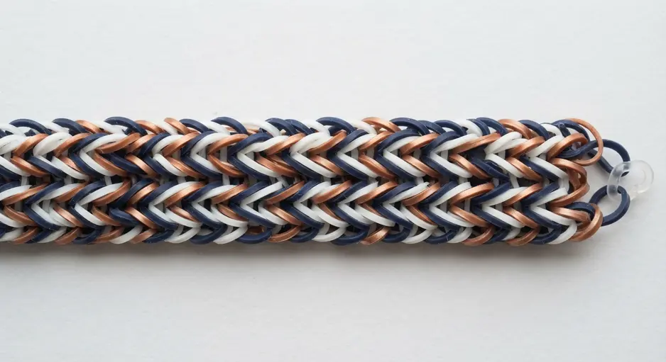 A bracelet with a sharp, repeating V-shaped chevron pattern in contrasting colors.